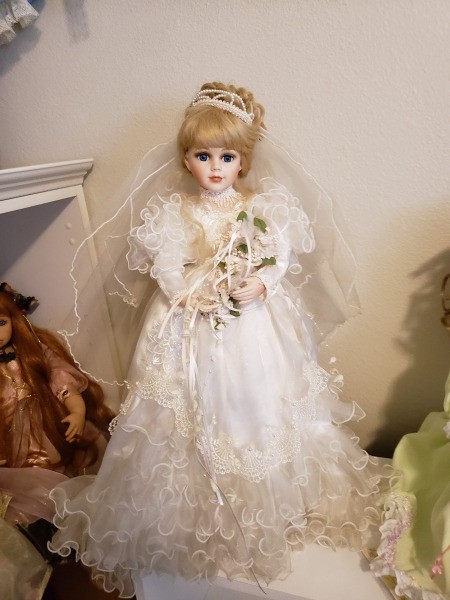 A collectible porcelain doll.