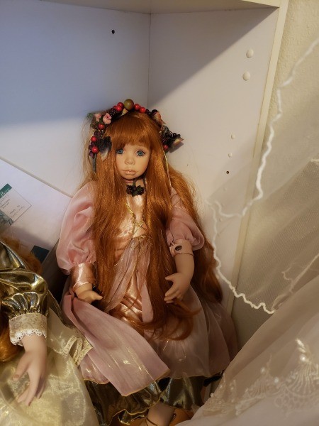 A collectible porcelain doll.