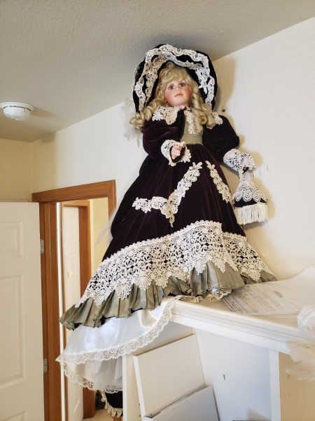 A collectible porcelain doll.