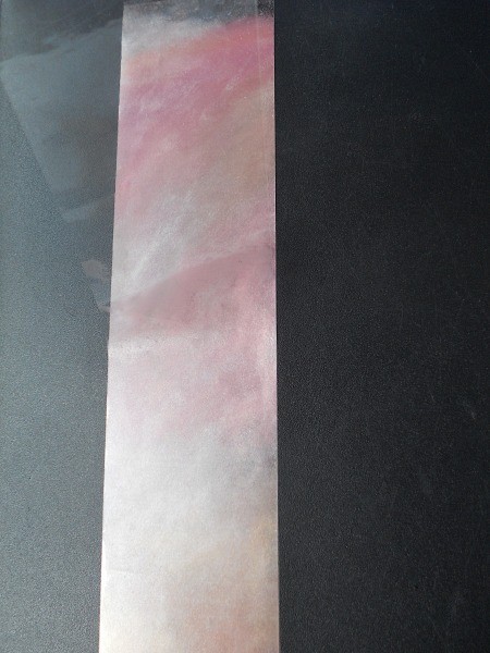 A colorful bookmark made from adhesive tape.