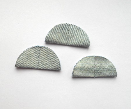 The three folded and sewn circles.