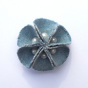 The completed beaded flower brooch.