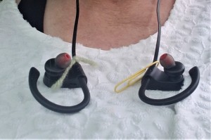 A pair of headphones that can be connected with a paper clip.
