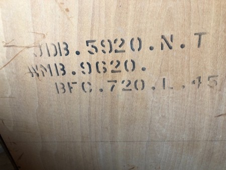 The markings on the back of a piece of furniture.
