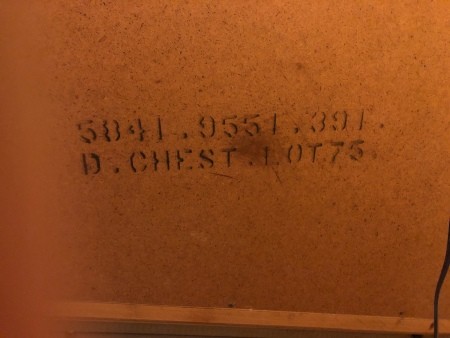 The markings on the back of a piece of furniture.