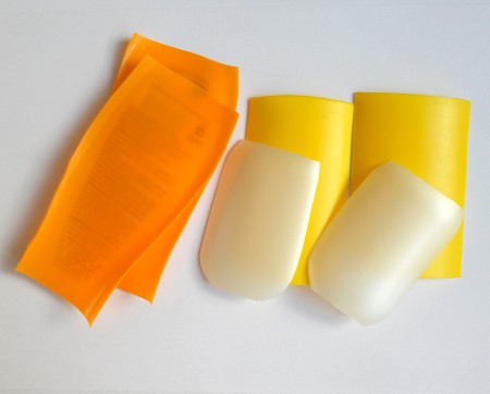 Cutting the recycled bottles into pieces.