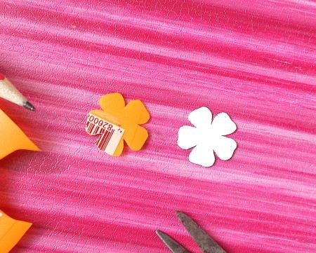 Cutting out the flower shapes.