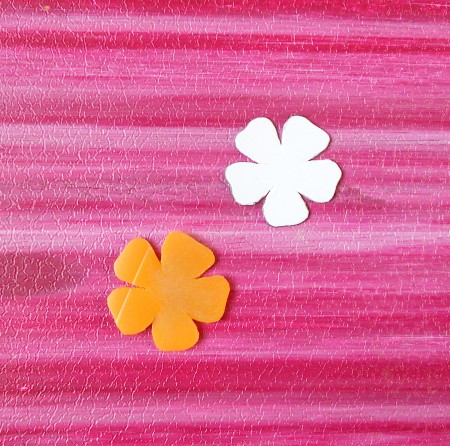 Cutting out the flower shapes.