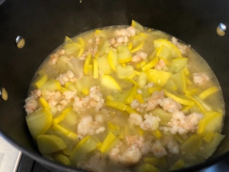 Cooking the soup in a stockpot.