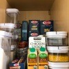 A clean and organized pantry shelf.