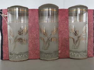 Three decorative glasses in a cardboard package.