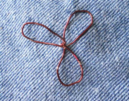 the backside of the attached wire flower.