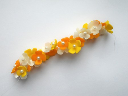 A band of recycled plastic flowers.