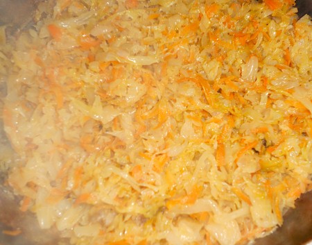 Cooking the cabbage filling.