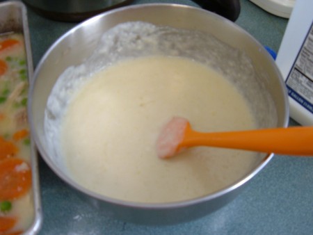 Mixing the crust together.