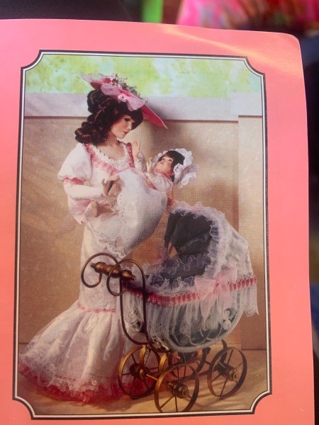 A mother and child porcelain doll set.