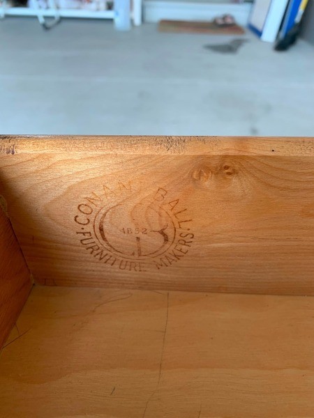 The Conant Ball marking inside a drawer.