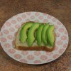 A slice of avocado toast.