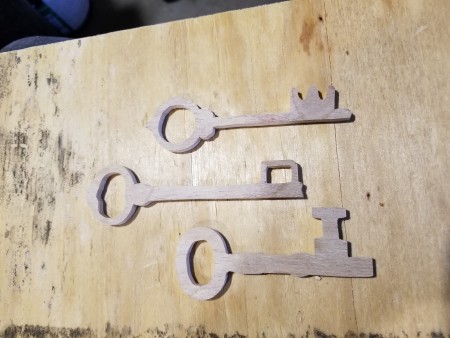 Three cut out key shapes.