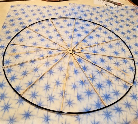 Painting the wire form white.