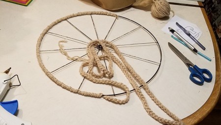 Adding the crocheted chain to the wire form.