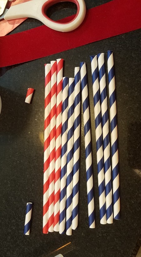 Cutting the straws to the correct lengths.