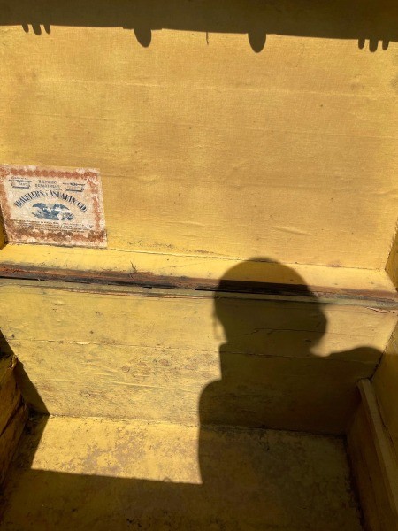 The inside of a trunk.