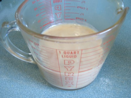 Gluten free cream of chicken soup in a measuring cup.