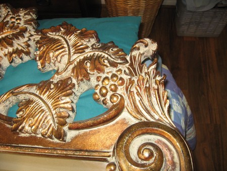 A close up of the carved mirror.