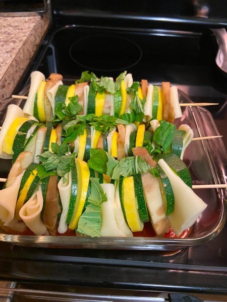 A completed row of kabobs.