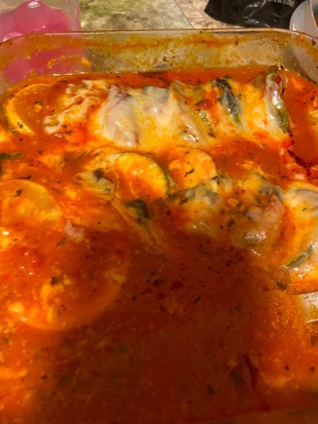 The cooked pan of ratatouille kabobs.