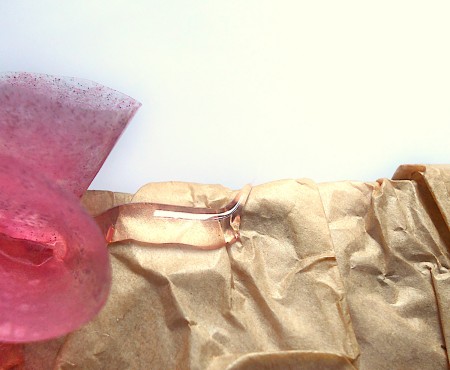 Attaching the folded circles to the paper.