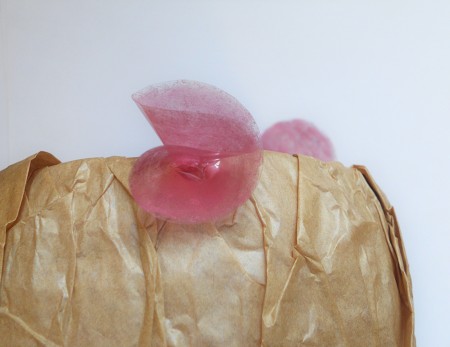 Attaching the folded circles to the paper.