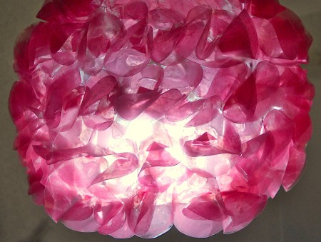 The completed lampshade when lit.