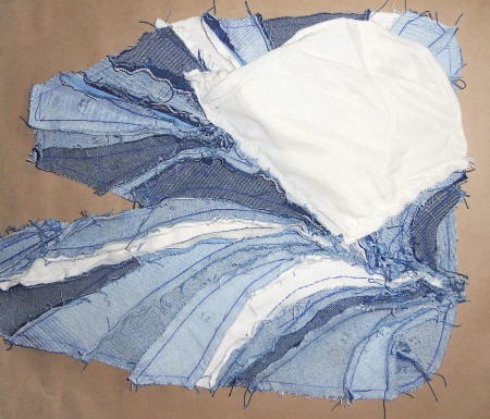 Sewing a pocket into the bag.