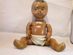 A baby doll wearing a diaper.