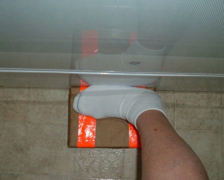 Using a thick book for step exercises