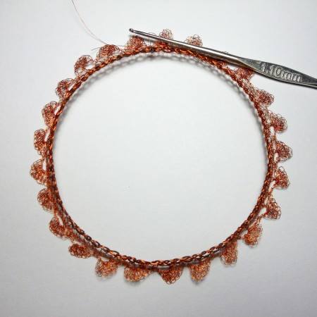 Finishing the crocheted bangle.