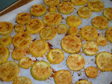 The baked squash rounds on a cookie sheet.