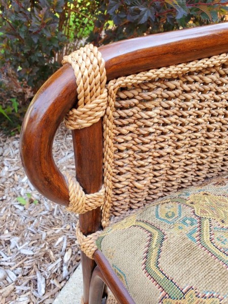 The woven back of the chair.