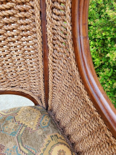 The woven back of the chair.