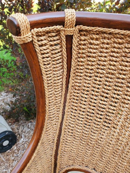 The woven back of the chair.