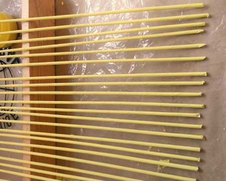 Painting the tubes yellow.