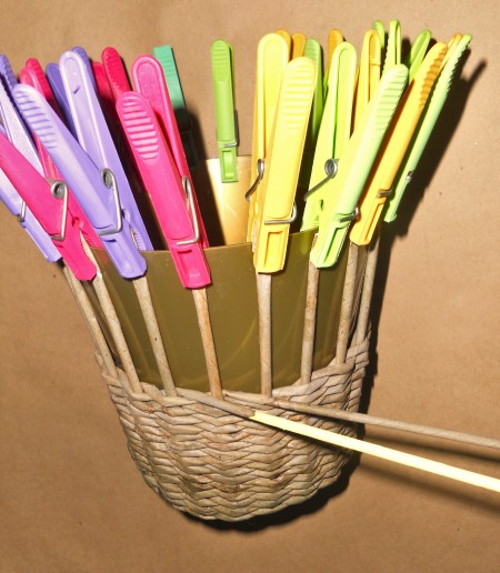 Weaving a basket with the paper tubes.