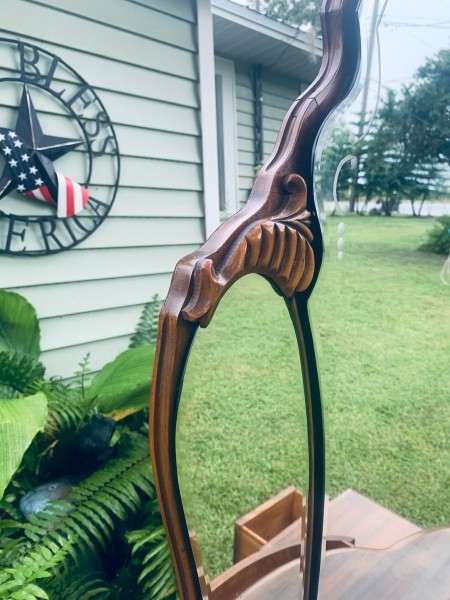 A close up of the mirrors on the vanity.