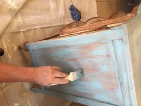 Dry painting the sanded buffet.