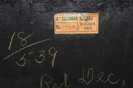 Markings on the back of a humidor.