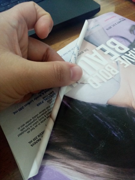 Rolling recycled paper to make the trellis.