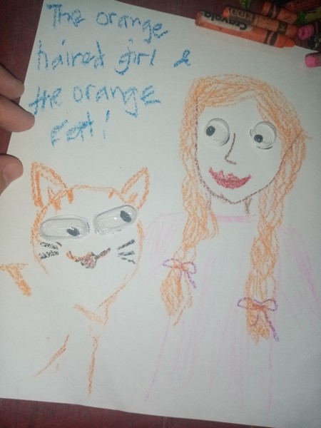 A drawing with homemade wiggly eyes.