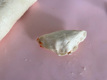 A formed hot pocket, ready for baking.